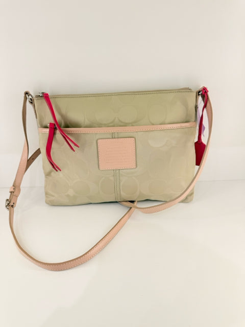 Pre Owned Coach Nylon Beige All over logo w/pink straps/trip Cross Body