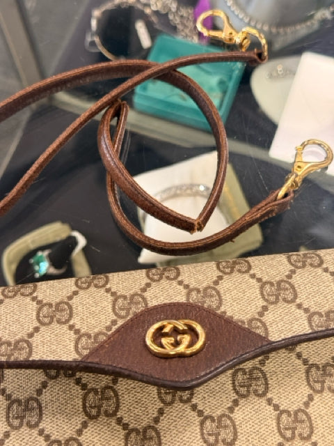 Pre Owned Gucci Monogram Mini Pouch with Gold GG Front