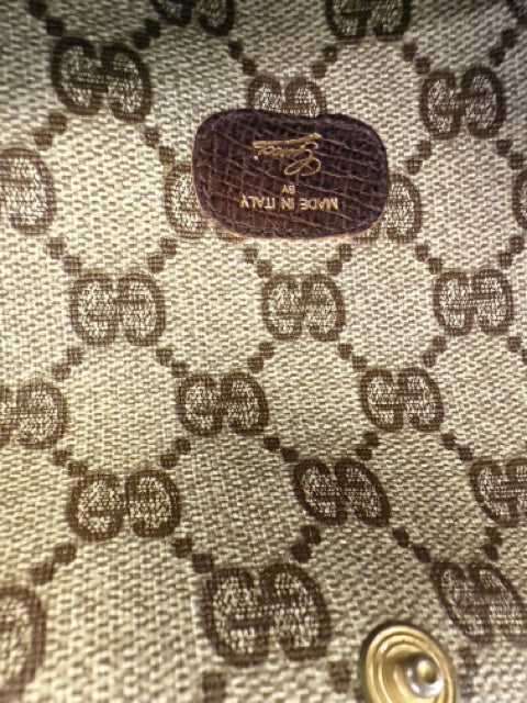 Pre Owned Gucci Monogram Mini Pouch with Gold GG Front