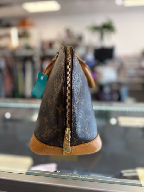 Louis Vuitton Alma Canvas Monogram Hand Bags