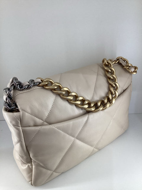 Pre Owned Chanel 19 Medium Flap Bag featuring elegant two-tone hardware and comes with the original dust bag.