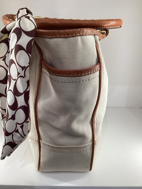 Pre Owned Coach Beige Leather handles w/coach logo and C logo scarf Tote Bag.
