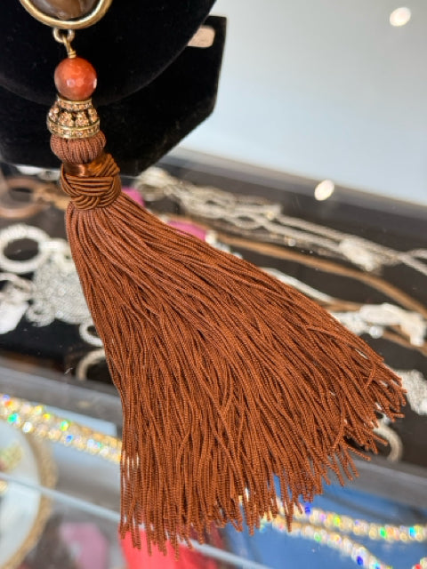 Heidi Daus Carved serpent dragon w Tassel  Rust orange 7 clear beads Necklace