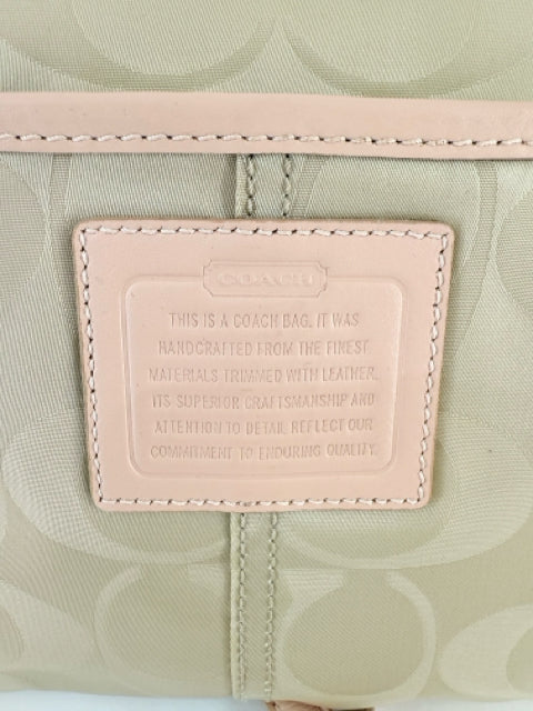 Pre Owned Coach Nylon Beige All over logo w/pink straps/trip Cross Body