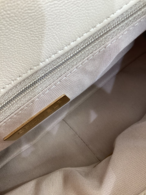 Pre Owned Chanel 19 Medium Flap Bag featuring elegant two-tone hardware and comes with the original dust bag.