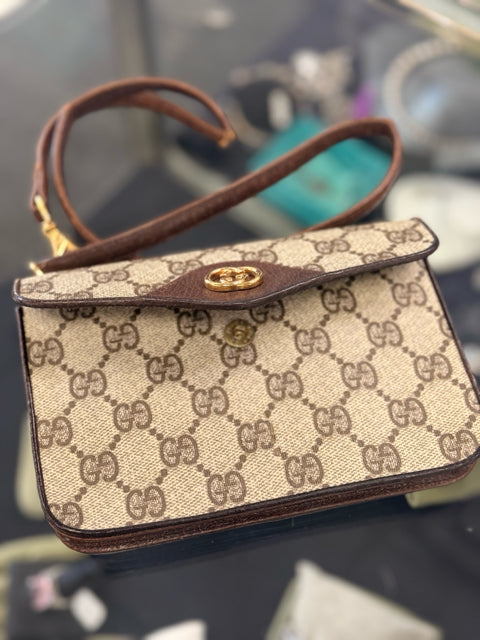 Pre Owned Gucci Monogram Mini Pouch with Gold GG Front