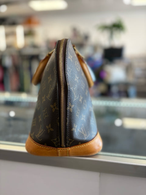 Louis Vuitton Alma Canvas Monogram Hand Bags
