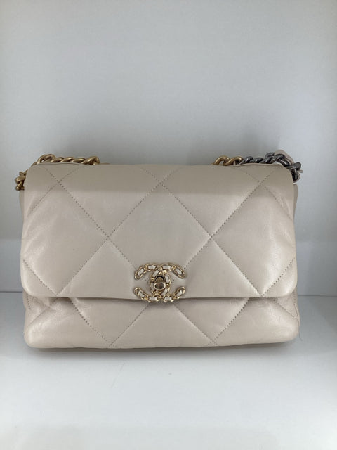Pre Owned Chanel 19 Medium Flap Bag featuring elegant two-tone hardware and comes with the original dust bag.