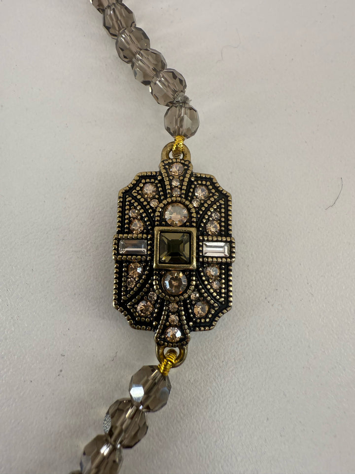 Heidi Daus HSN Vintage Deco Trilogy Crystal Pendant 4 station smoky quartz toggle Necklace