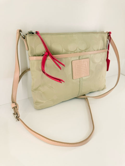 Pre Owned Coach Nylon Beige All over logo w/pink straps/trip Cross Body