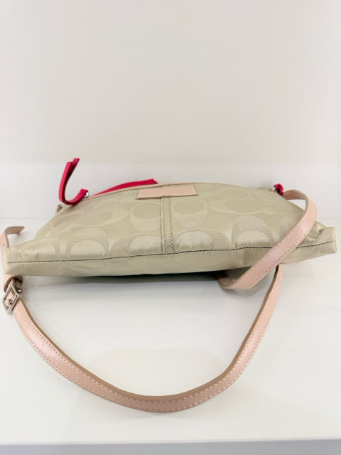 Pre Owned Coach Nylon Beige All over logo w/pink straps/trip Cross Body
