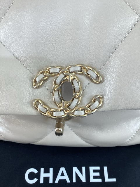 Pre Owned Chanel 19 Medium Flap Bag featuring elegant two-tone hardware and comes with the original dust bag.