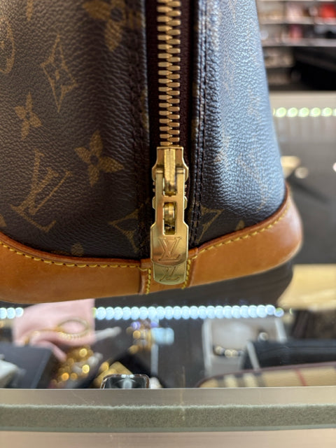 Louis Vuitton Alma Canvas Monogram Hand Bags