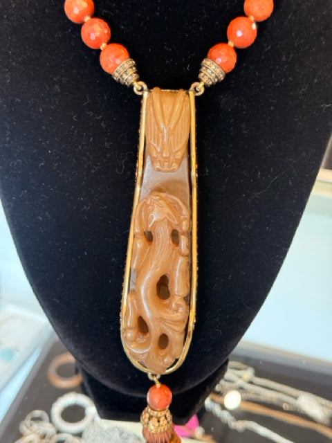 Heidi Daus Carved serpent dragon w Tassel  Rust orange 7 clear beads Necklace