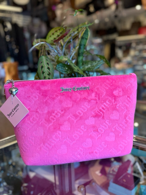 Juicy Couture Pink Cosmetic Case Bag

NWT Zipper and Charm