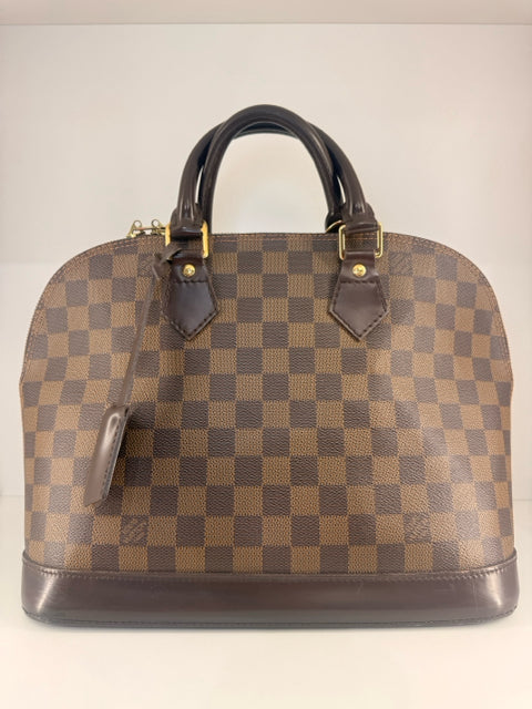 Louis Vuitton Canvas Damier Ebene Alma Checker Print Handbags
Alma PM Serial # FL0096
Red Fabric Interior
