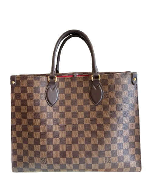 On-The-Go Louis Vuitton With wristlet and raspberry interior 