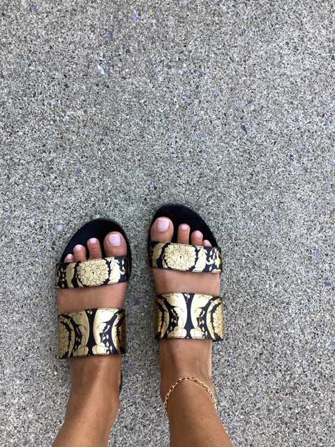 Versace Sz 37  Black/Gold Sandal
Two strap gold/blk floral print