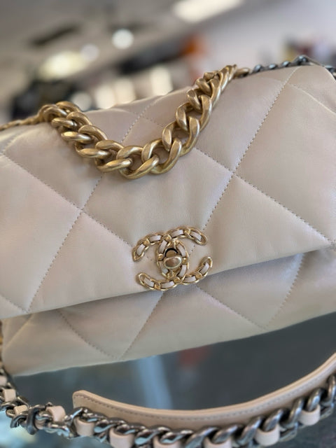 Pre Owned Chanel 19 Medium Flap Bag featuring elegant two-tone hardware and comes with the original dust bag.