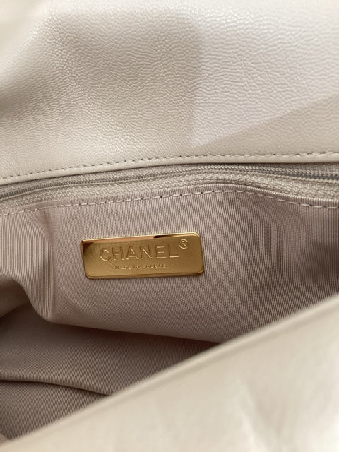 Pre Owned Chanel 19 Medium Flap Bag featuring elegant two-tone hardware and comes with the original dust bag.