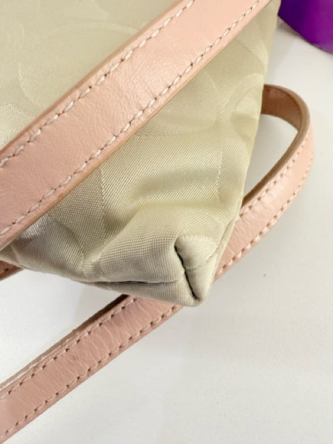 Pre Owned Coach Nylon Beige All over logo w/pink straps/trip Cross Body