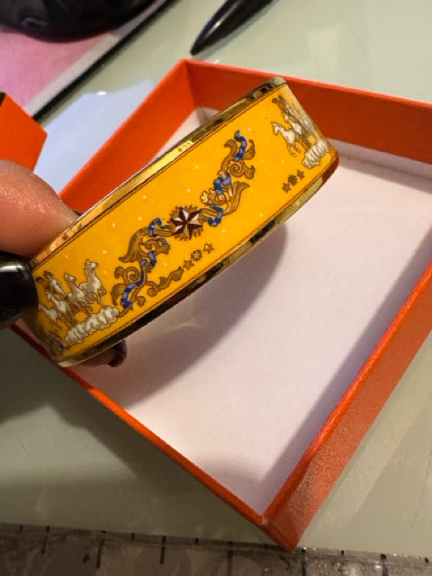 Hermes' Designer Wide Bangle Bracelet