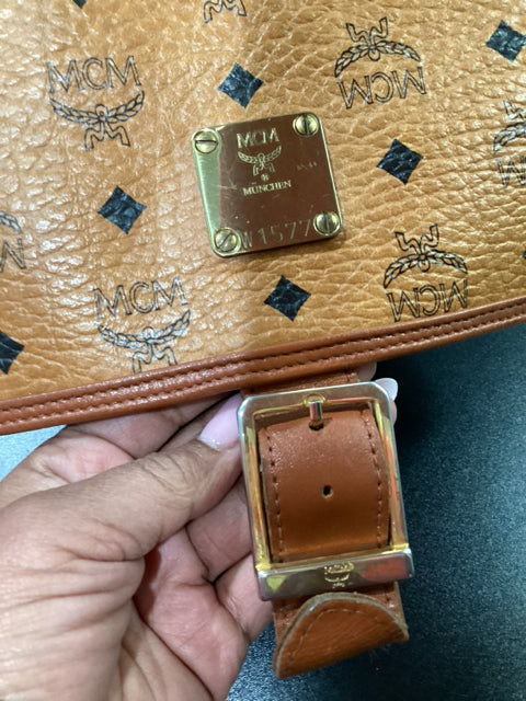 MCM Tan and Black Leather Messenger with gold front buckle Designer Bag