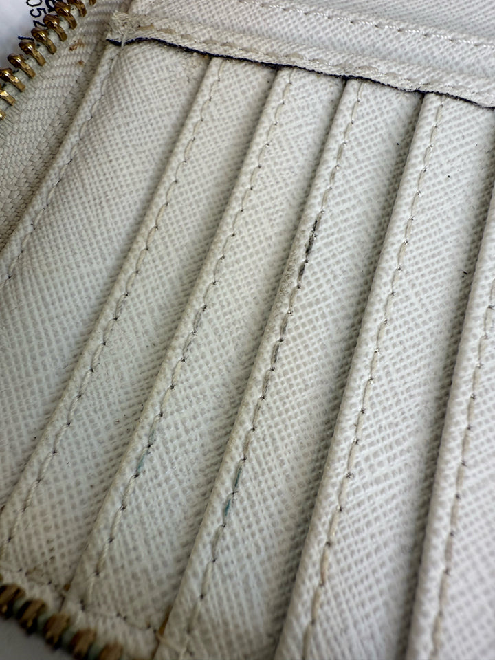 Michael Kors Monogram Zippy Wallet