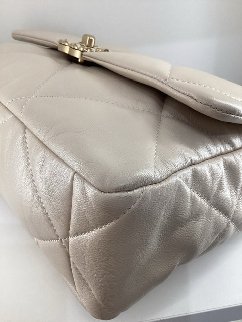Pre Owned Chanel 19 Medium Flap Bag featuring elegant two-tone hardware and comes with the original dust bag.
