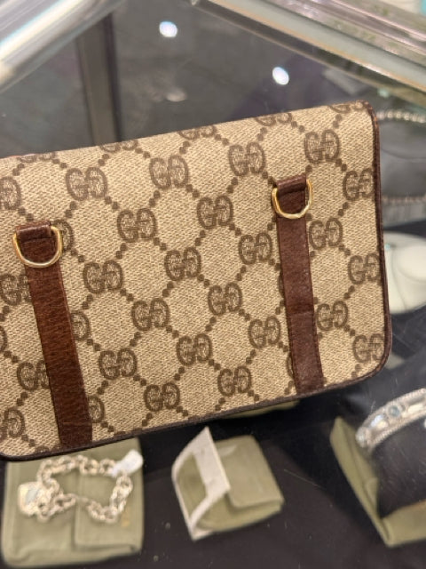 Pre Owned Gucci Monogram Mini Pouch with Gold GG Front