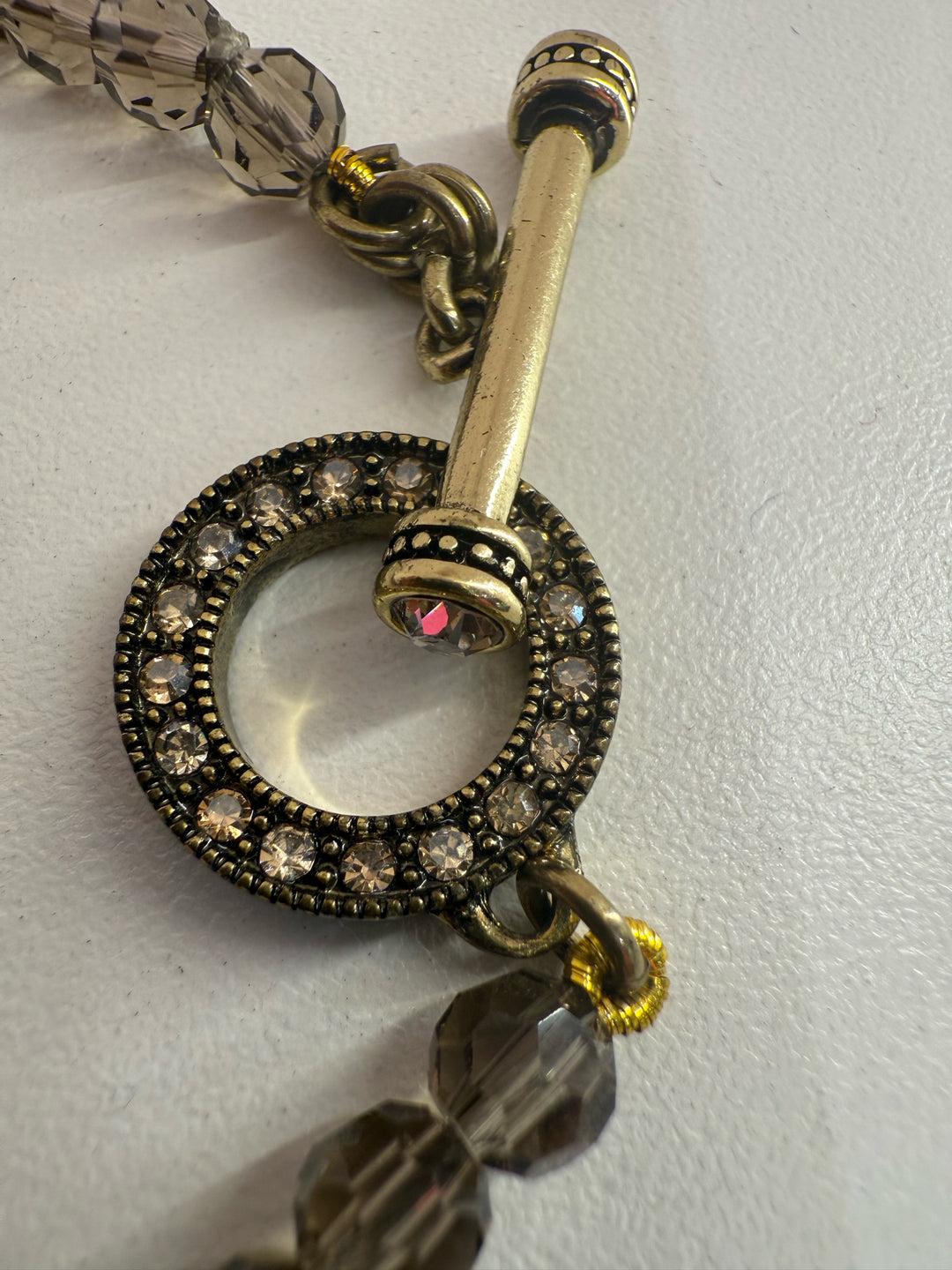 Heidi Daus HSN Vintage Deco Trilogy Crystal Pendant 4 station smoky quartz toggle Necklace