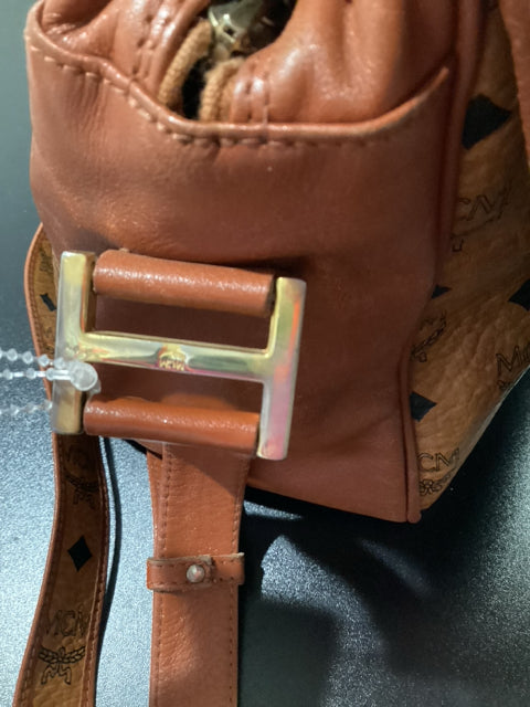 MCM Tan and Black Leather Messenger with gold front buckle Designer Bag