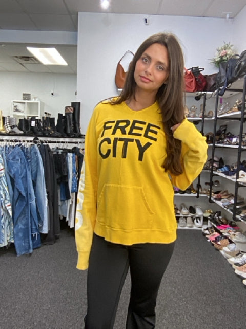 Pre Loved Free City Sz M Yellow Hooded Sweatshirt "Sending Light" Sweatshirt.