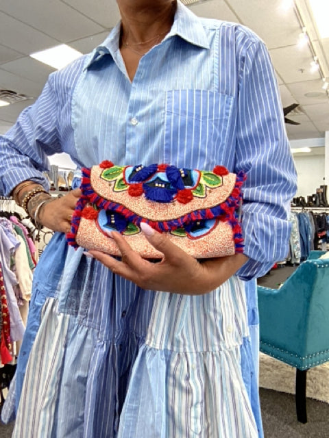 Pre Owned Tory Burch Fold Over Bead and Tassel Clutch Bag.