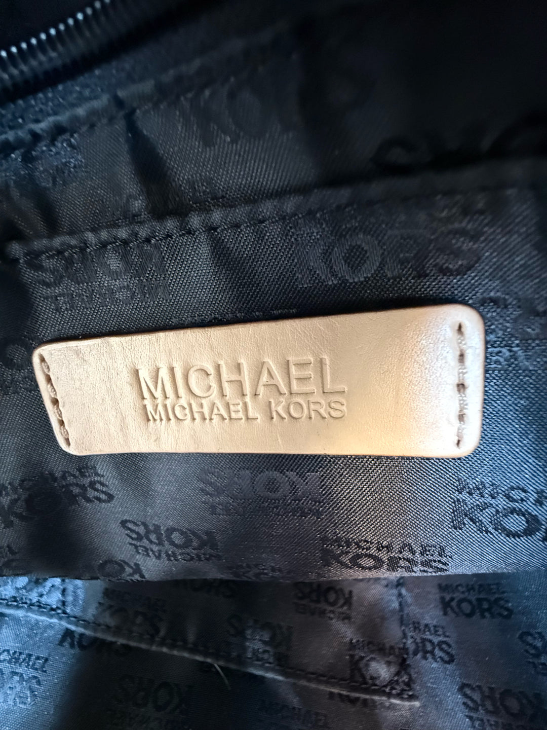 Michael Kors Allover Embossed MK LogoTote Bag