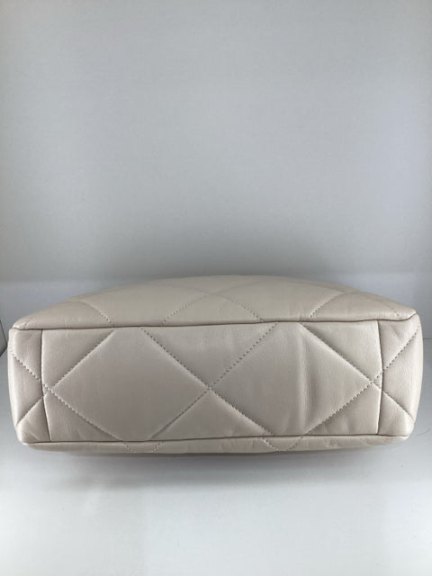 Pre Owned Chanel 19 Medium Flap Bag featuring elegant two-tone hardware and comes with the original dust bag.