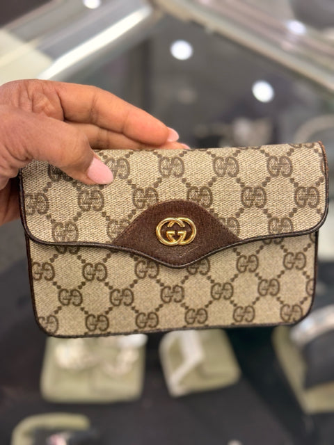 Pre Owned Gucci Monogram Mini Pouch with Gold GG Front