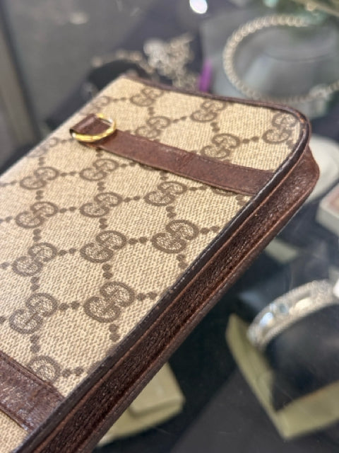 Pre Owned Gucci Monogram Mini Pouch with Gold GG Front