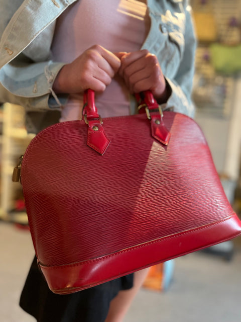 Louis Vuitton Red Epi Alma PM with Strap at Jill's Consignment