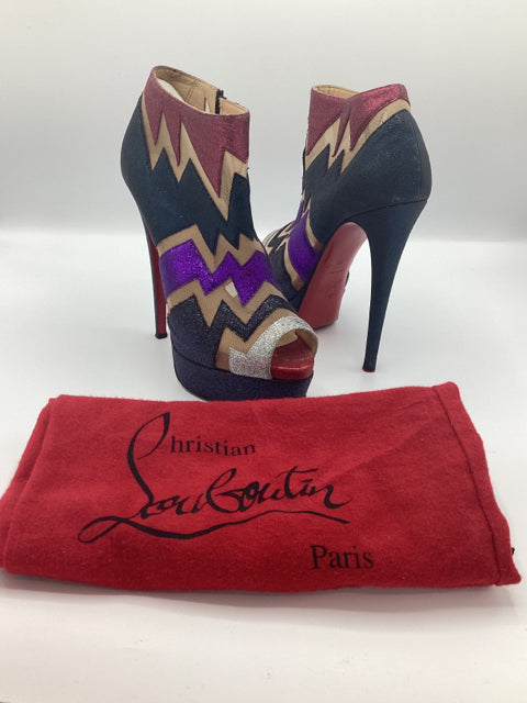 Christian Louboutin Sz 36 Ziggy Ankle Boots  

Multicolor glitter mesh 
Peep toe
5.5" heel