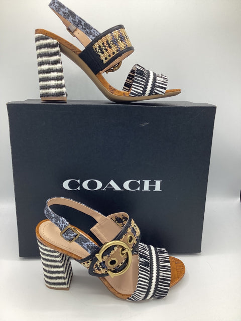 Coach Sz 8.5 Robin C Buckle Raffia Slingback Sandal Shoe  
Black/White
Open toe
Leather and cork insole
4" Heel