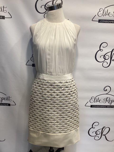 Giambattista Valli Sleeveless Sz 42 Dress  

Chiffon pleated top   
Straight metallic boucle' skirt