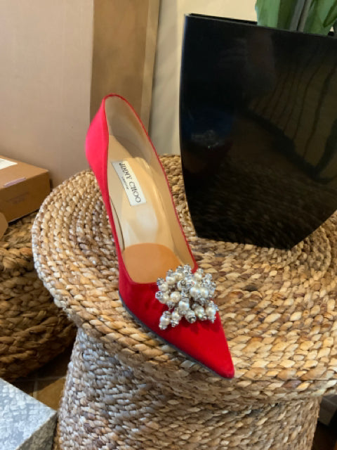 Jimmy Choo Satin Pump With Pearls Sz 38.5 Shoe

Pearl with silver hardware
4" heel