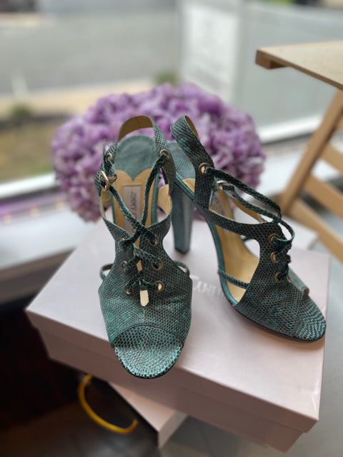 Jimmy Choo Lizard Open Toe Sz 39.5 Shoe

Lace up 
Buckle sling back  
Turquoise 
Thick 4' heel