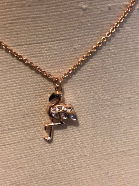 Kate Spade Flamingo Necklace  
20" - 24" Chain lenght
Gold tone chain
.5" wide/ 1" Height