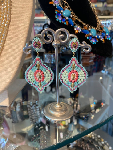 Miguel Ases Beaded Drop Earrings 

Two Tone Carribean Blue and Mauve
Gold tone metal