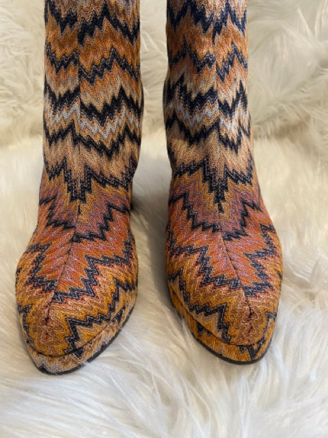 Missoni Mid-Calf Sz 38 Boot

Warm multi colored
Zig Zag Print
Round-Toes
Wedge Heels with Platform
Concealed Zip Closure at Ankles