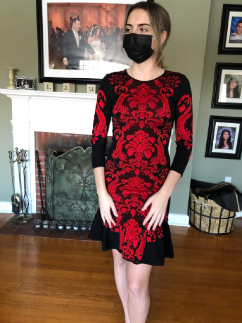 Roberto Cavalli Red/Black fitted knit dress flounce bottom Excellent Pre Loved Condition  Size 38